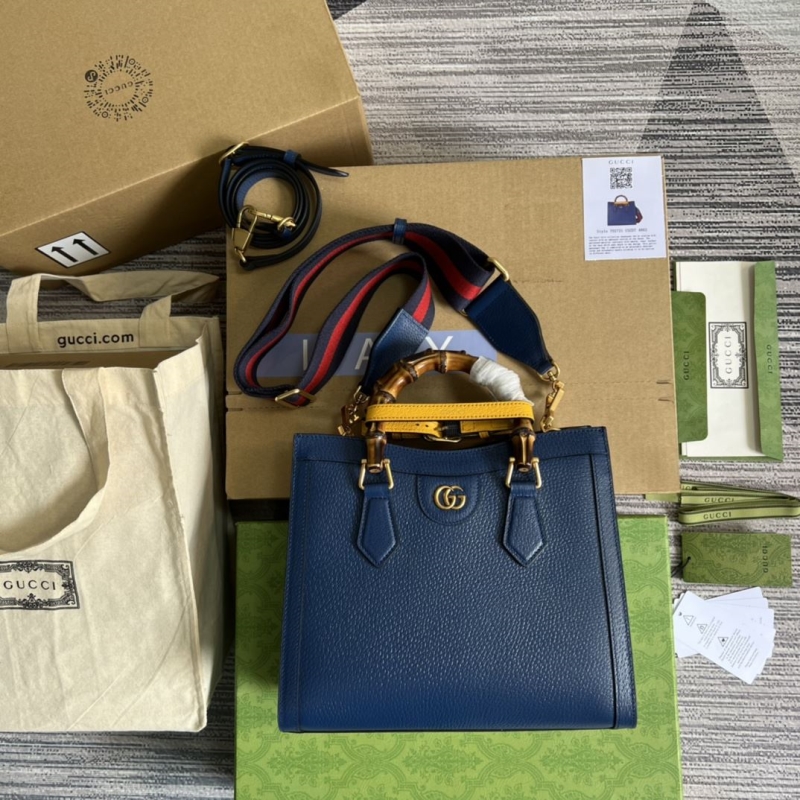 G*u*i top handle bags